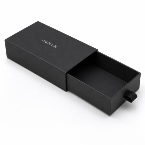 Black drawer jewelry box with the tray pulled out along the long edge, showing the 9 x 5 cm tray interior
