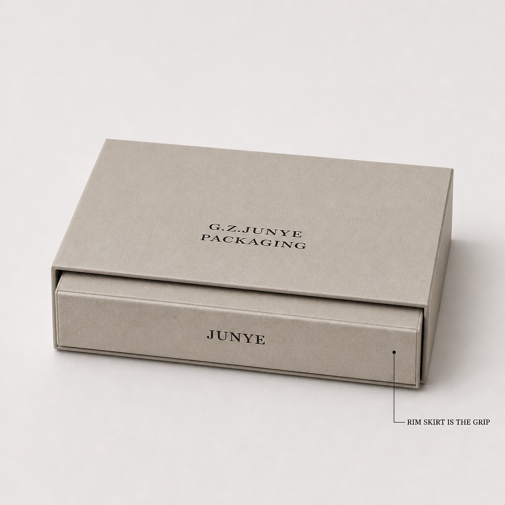 Light grey-beige rim fold jewelry case closed, with the rim skirt band at the tray end that works as the grip