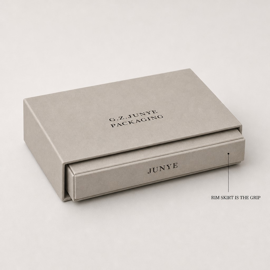 Rim fold jewelry case part open, showing the hairline seam where the skirt meets the five-face sleeve