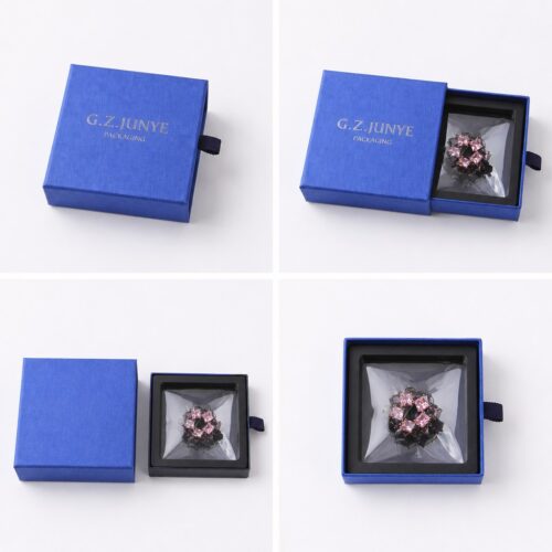 Four views of the blue drawer jewelry box: closed, with the tray drawn out, and the tray from above showing the black blister frame and clear bag