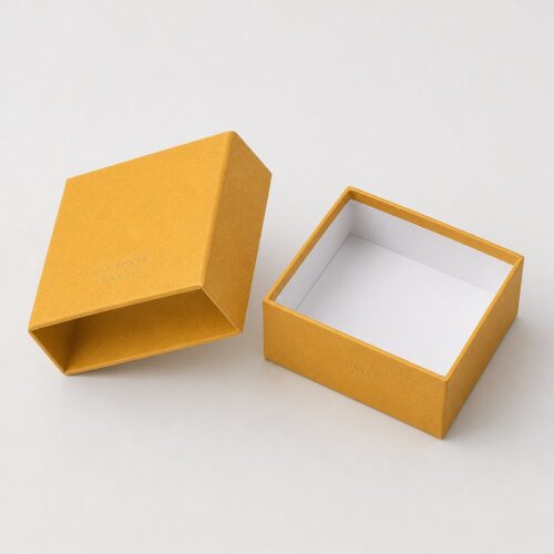 Rigid box lid tilted to show the four wall depth and the white liner paper