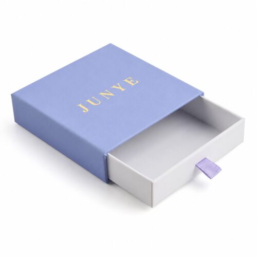 One-way drawer box pulled open, showing the empty white tray inside the blue sleeve
