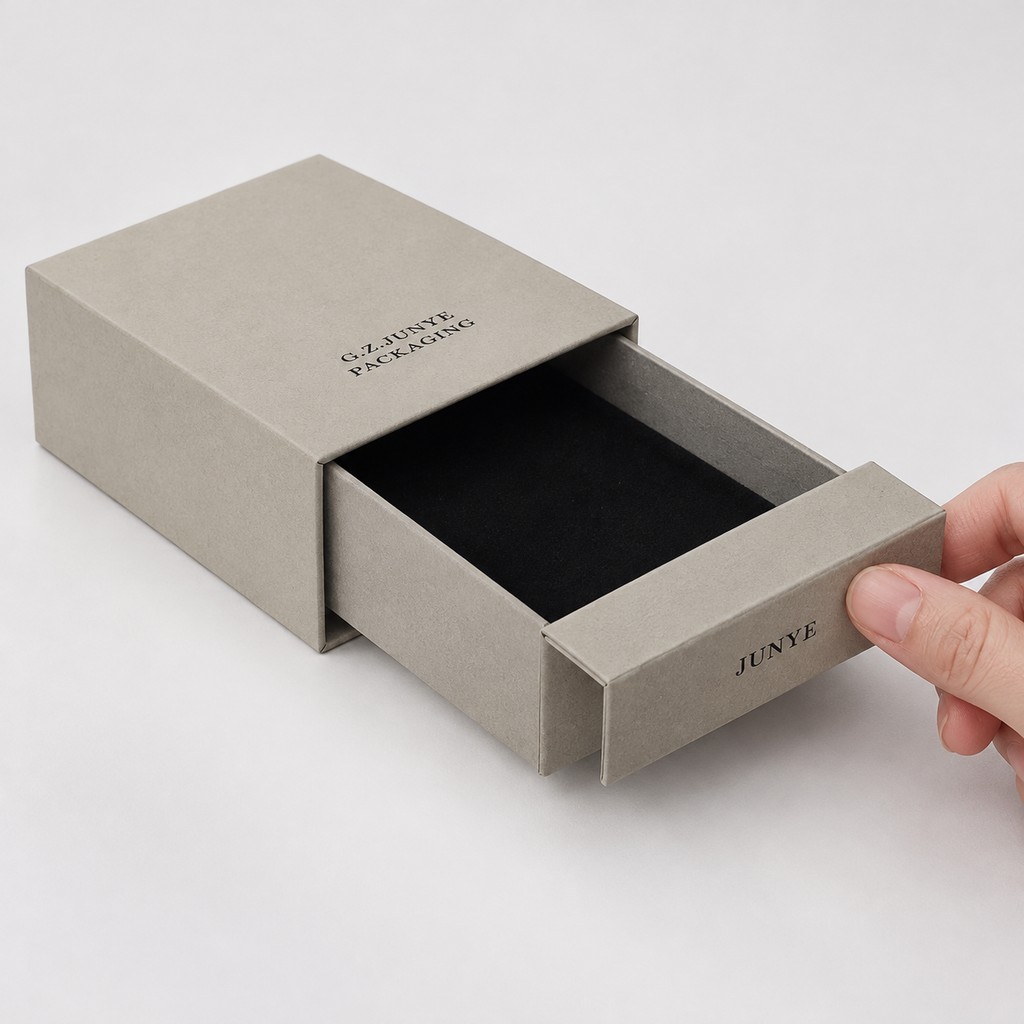 Drawer tray pulled out of the sleeve to show the flat black flocked lining with one slim inlay line