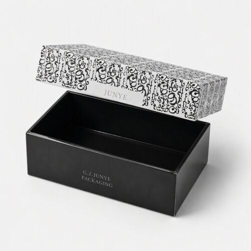 Lid lifted off the telescopic lid box to show the black folded base and its cavity